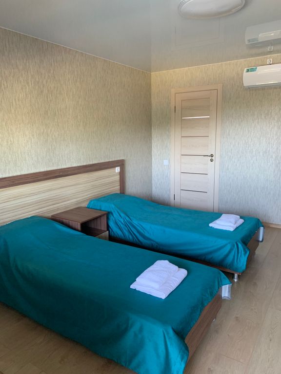 Двухместный номер с 2 отдельными кроватями улучшенный