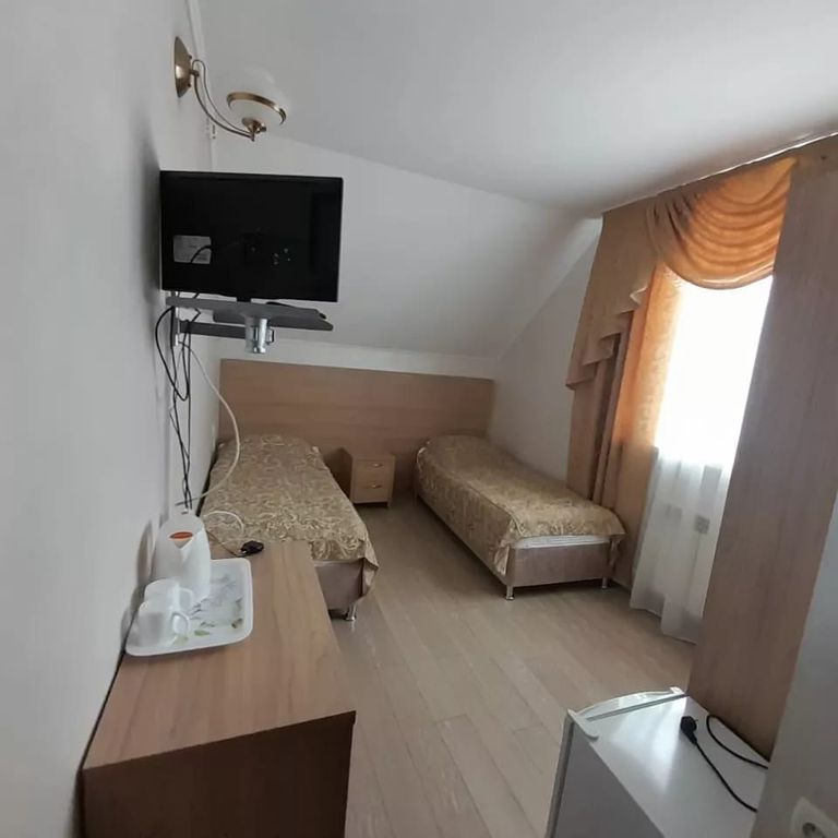 Двухместный номер с 2 отдельными кроватями стандарт