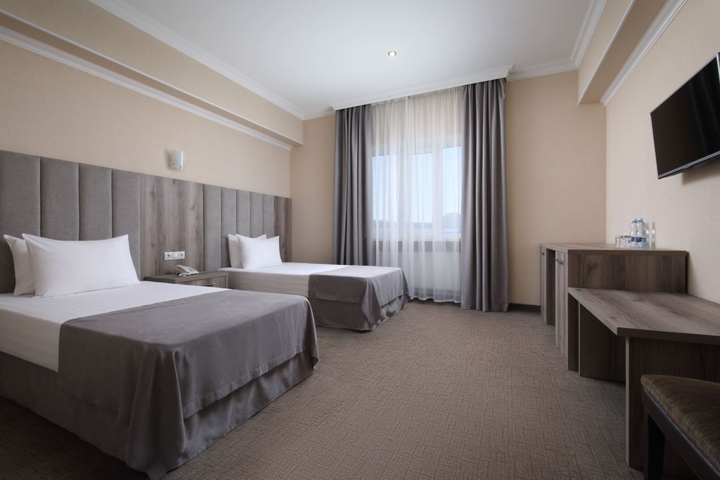 Двухместный номер с 2 отдельными кроватями стандарт