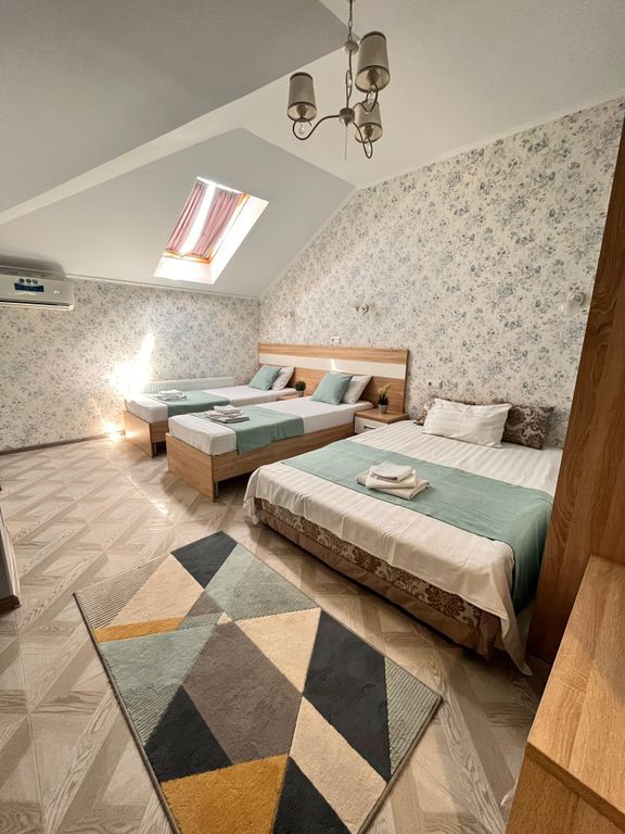 Трёхместный номер люкс