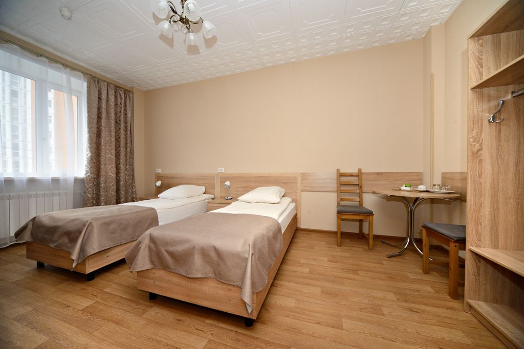 Трёхместный номер улучшенный с видом на город