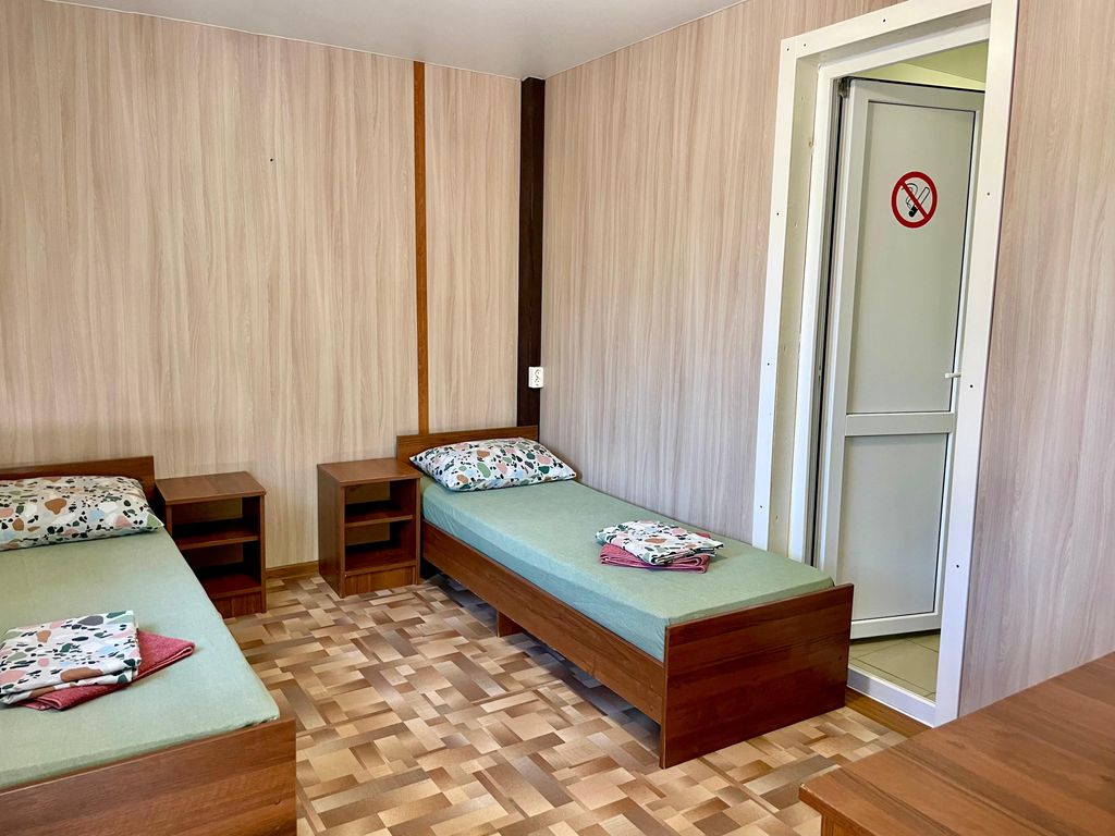 Двухместный номер с 2 отдельными кроватями Двухместный с двумя кроватями и вентилятором