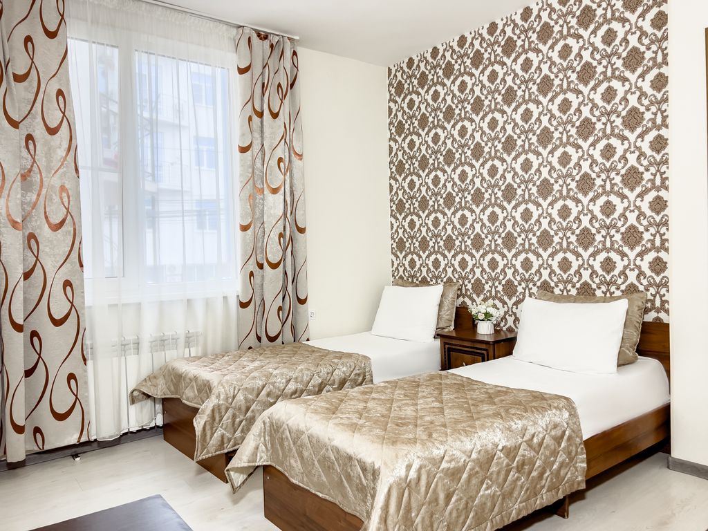 Двухместный номер с 2 отдельными кроватями полулюкс