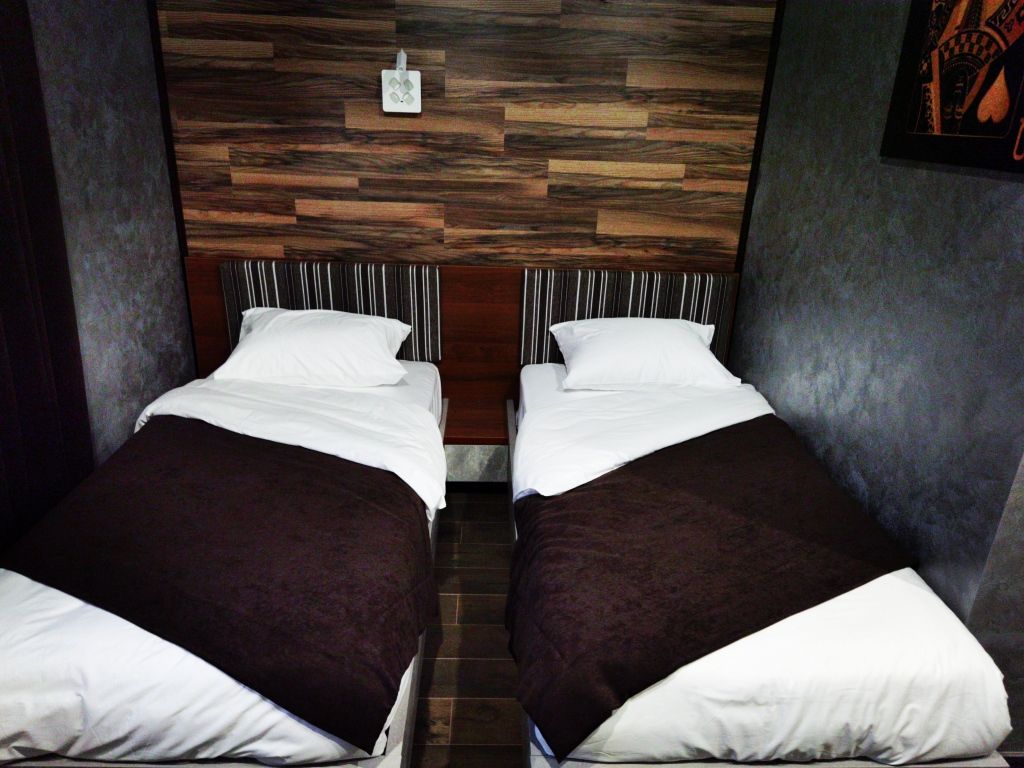 Двухместный номер с 2 отдельными кроватями улучшенный