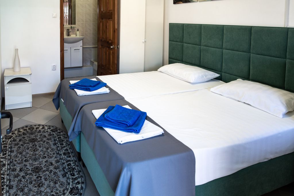 Двухместный номер с 2 отдельными кроватями улучшенный