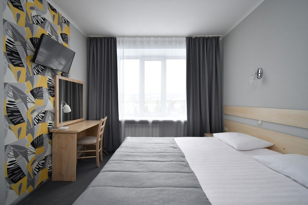 Двухместный номер с 1 кроватью джуниор сюит двухкомнатный