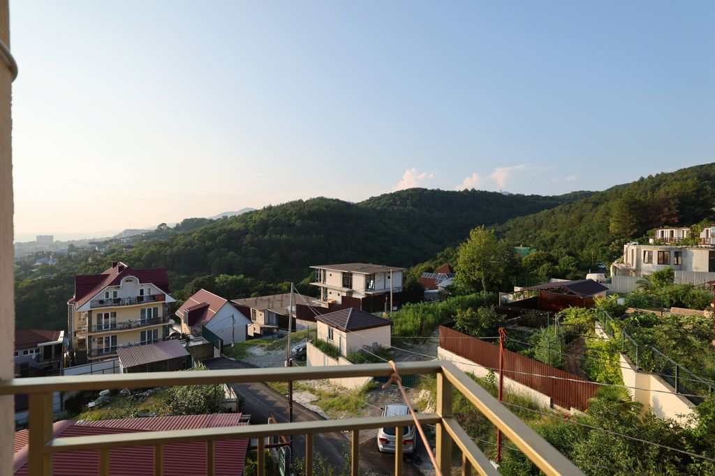 Семейный номер Четырехместный номер с доп. местом с балконом и видом на горы