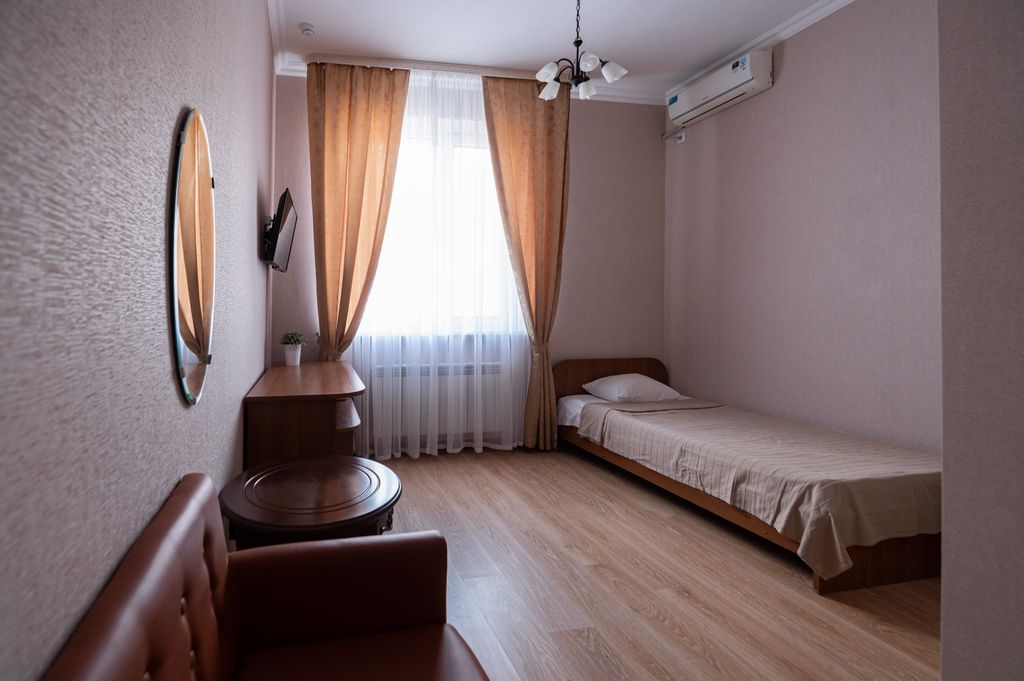 Одноместный номер Одноместный улучшенный стандарт