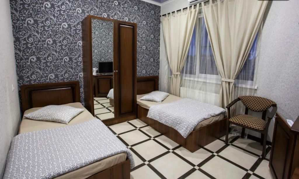 Двухместный номер с 2 отдельными кроватями Эконом с раздельными кроватями