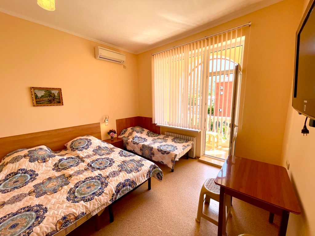 Четырёхместный номер делюкс с балконом