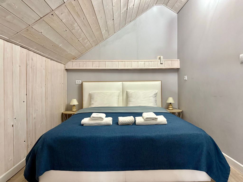 Семейный двухуровневый люкс с видом на город