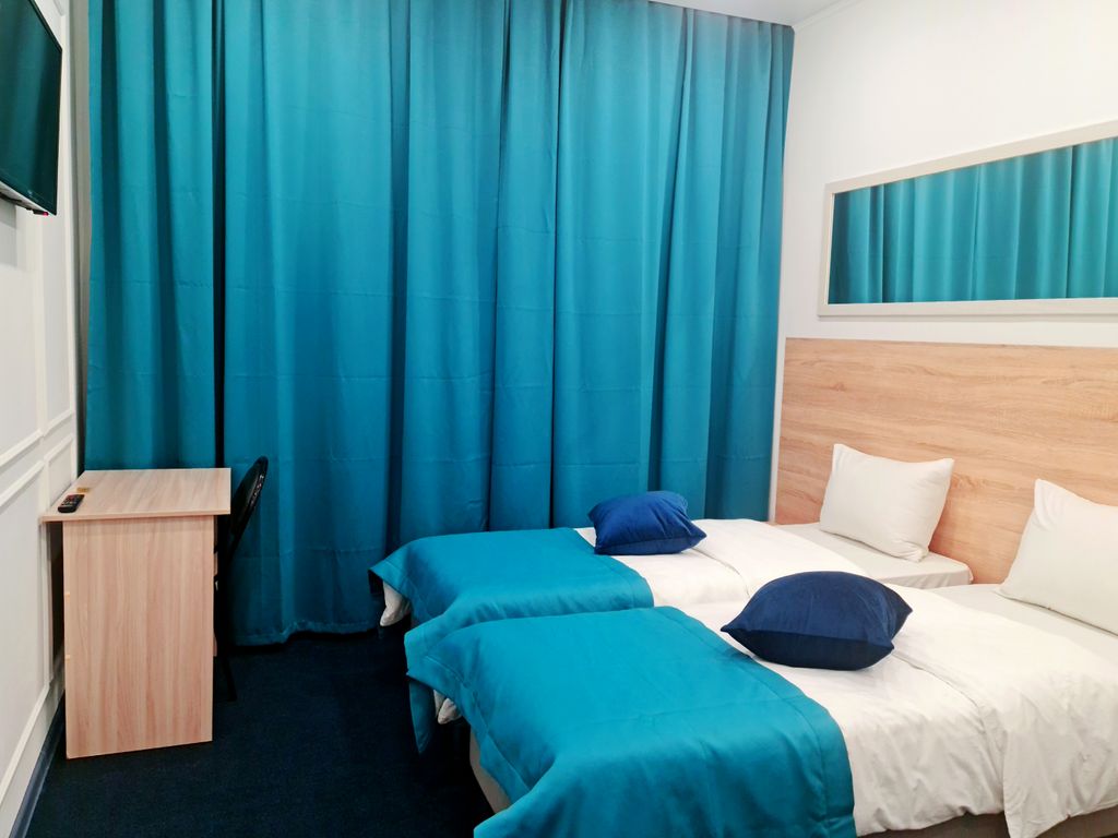 Двухместный номер с 2 отдельными кроватями стандарт