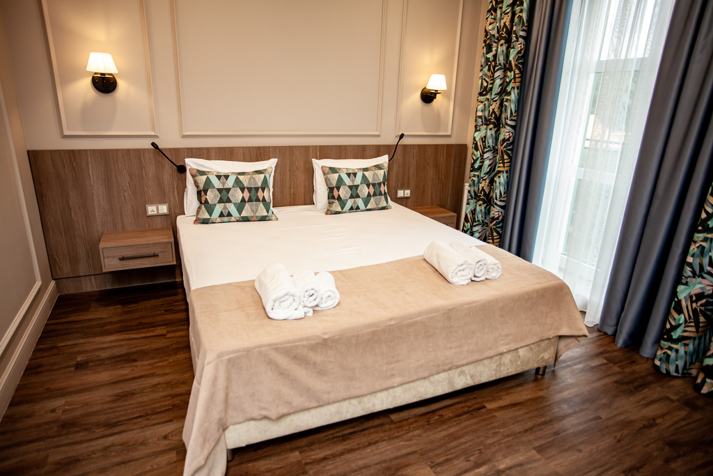 Трёхместный номер Де-люкс