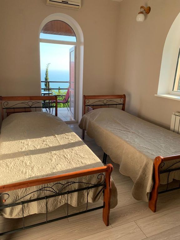 Двухместный номер с 2 отдельными кроватями стандарт с видом на море