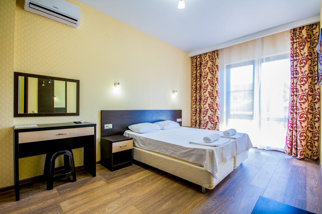 Четырёхместный номер Двухкомнатный стандарт с балконом