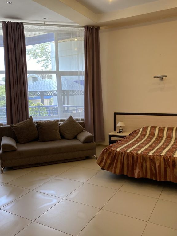 Четырёхместный номер Студио с балконом