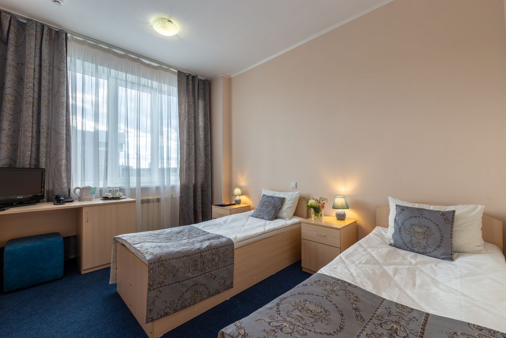 Двухместный номер с 2 отдельными кроватями стандарт