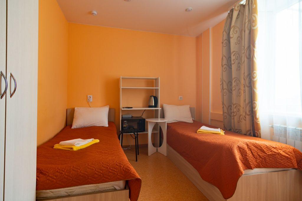 Двухместный номер с 2 отдельными кроватями стандарт