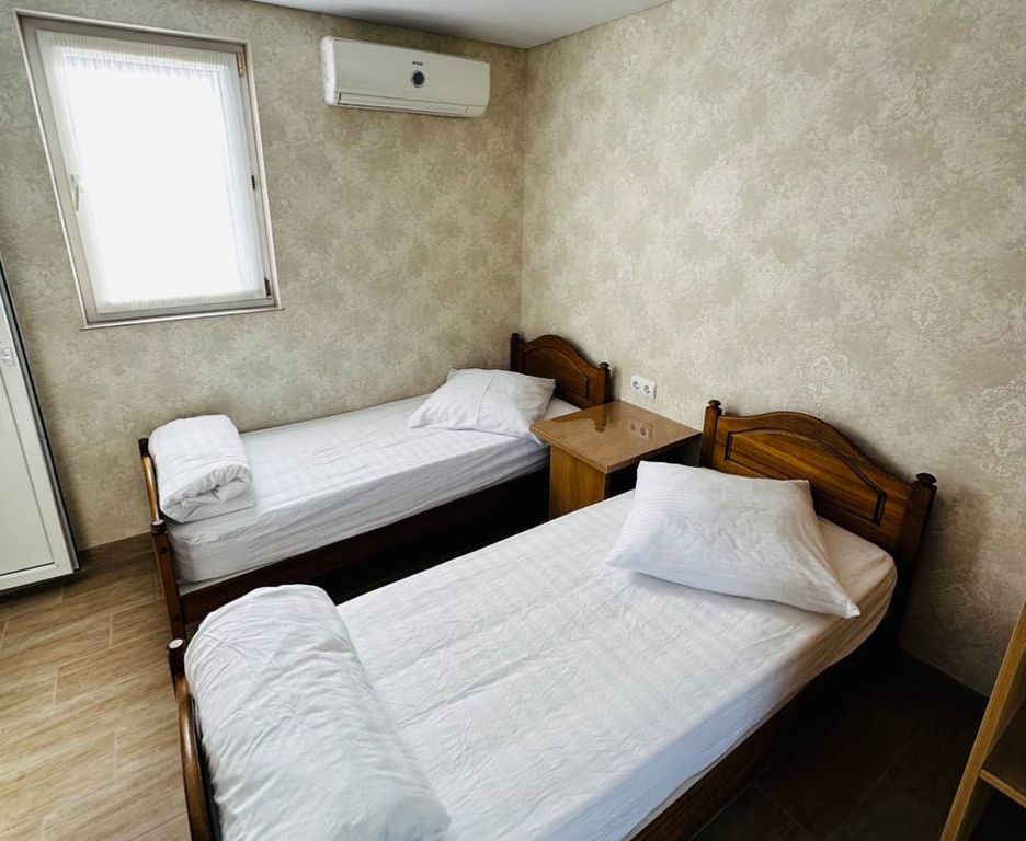 Двухместный номер с 2 отдельными кроватями стандарт