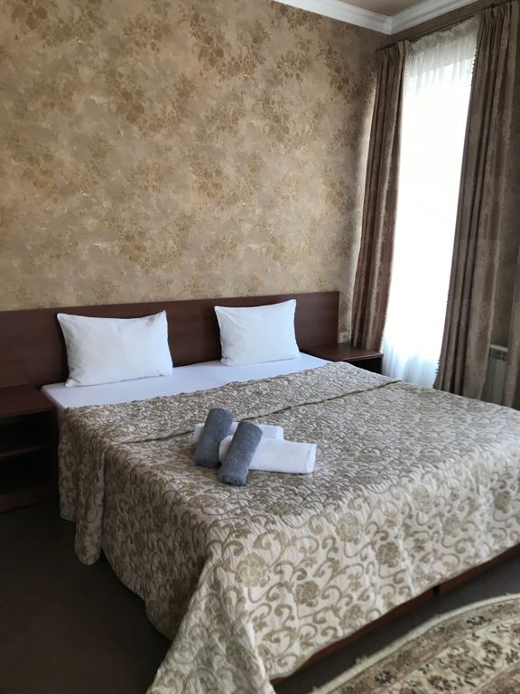 Двухместный номер с 2 отдельными кроватями улучшенный