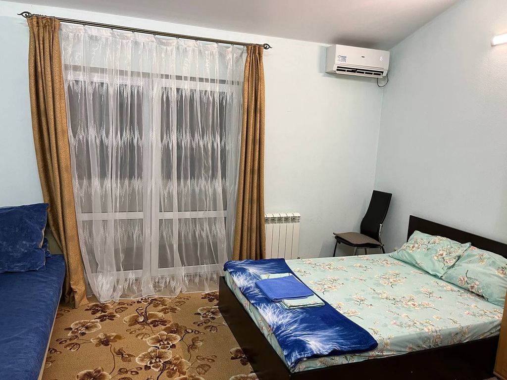 Четырёхместный номер стандарт с балконом