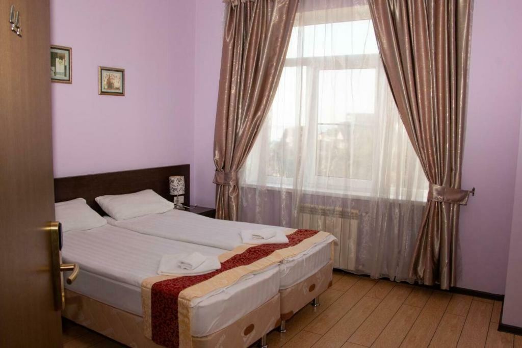 Двухместный номер с 2 отдельными кроватями стандарт