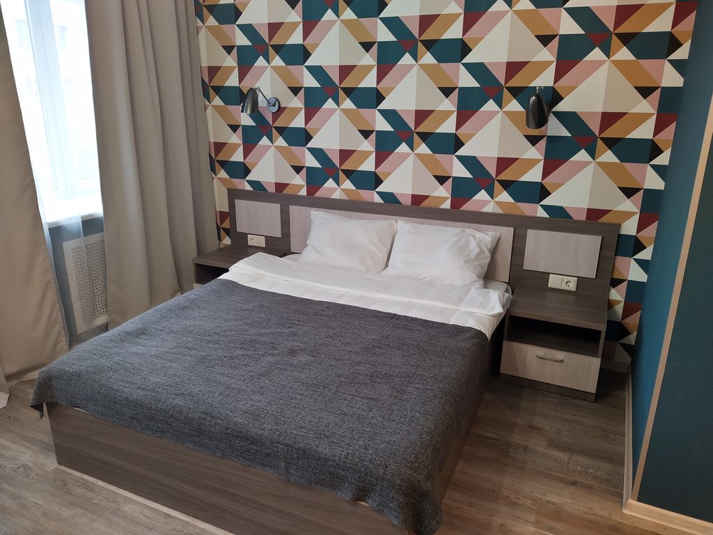 Семейный номер полулюкс с двуспальной кроватью и диваном