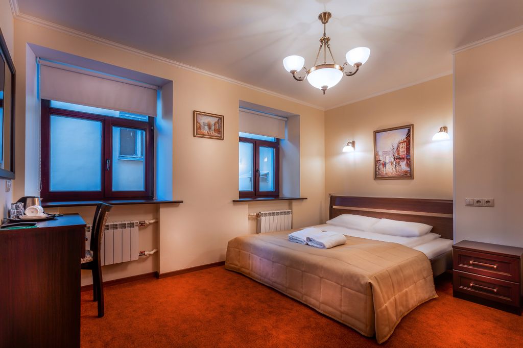 Семейный номер повышенной комфортности с кроватью кинг-сайз и джакузи