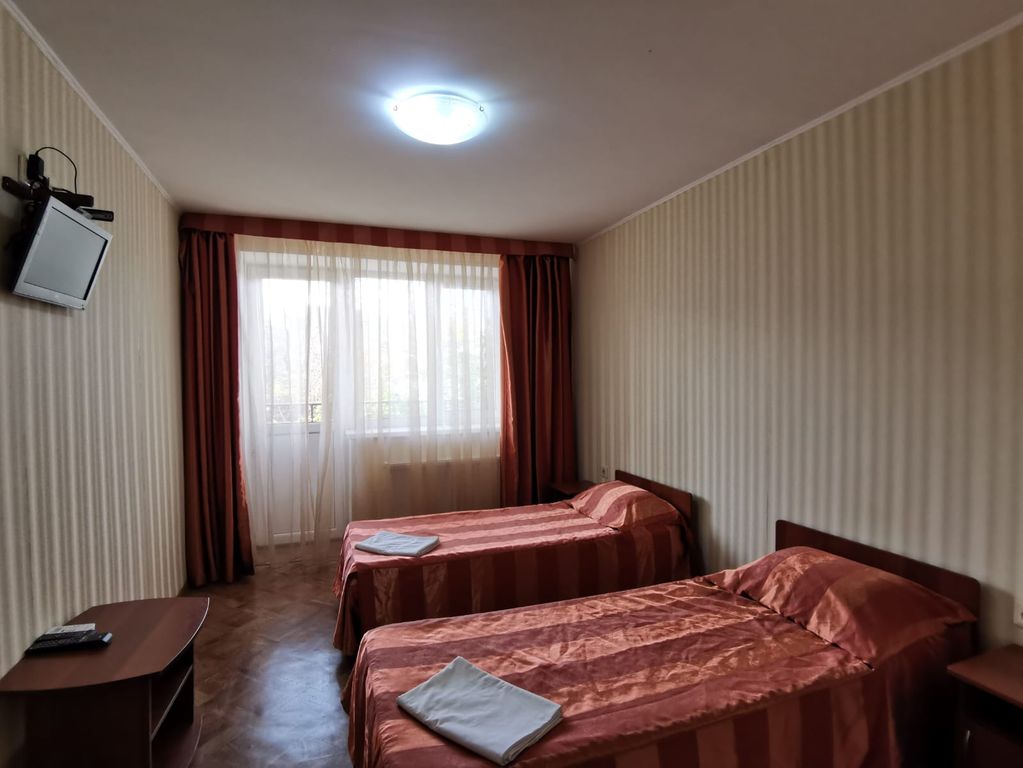 Двухместный номер с 2 отдельными кроватями эконом