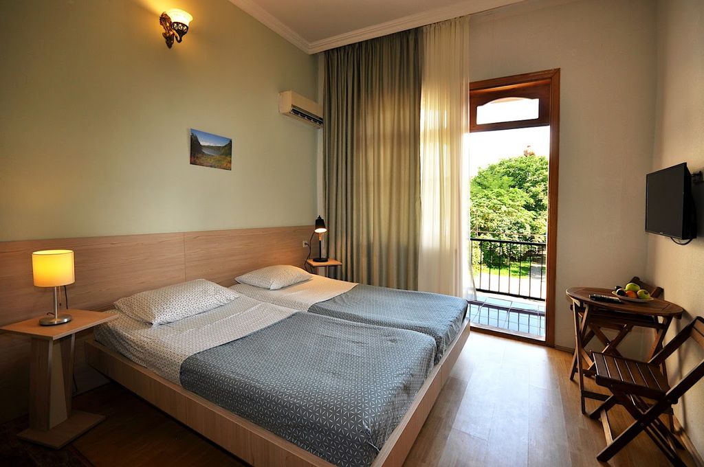 Двухместный номер с 2 отдельными кроватями улучшенный