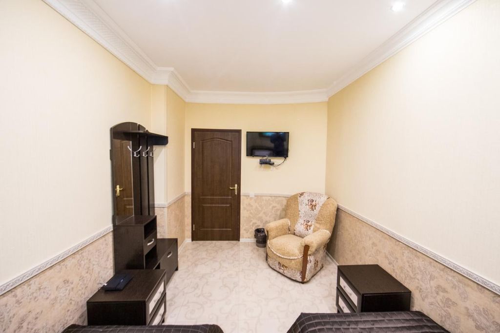 Двухместный номер с 2 отдельными кроватями эконом с общей ванной комнатой