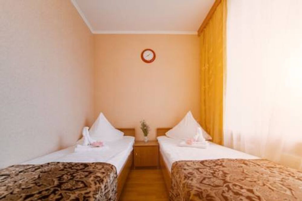 Двухместный номер с 2 отдельными кроватями эконом