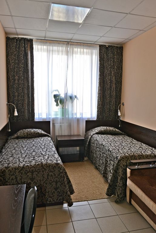 Двухместный номер с 2 отдельными кроватями Стандарт