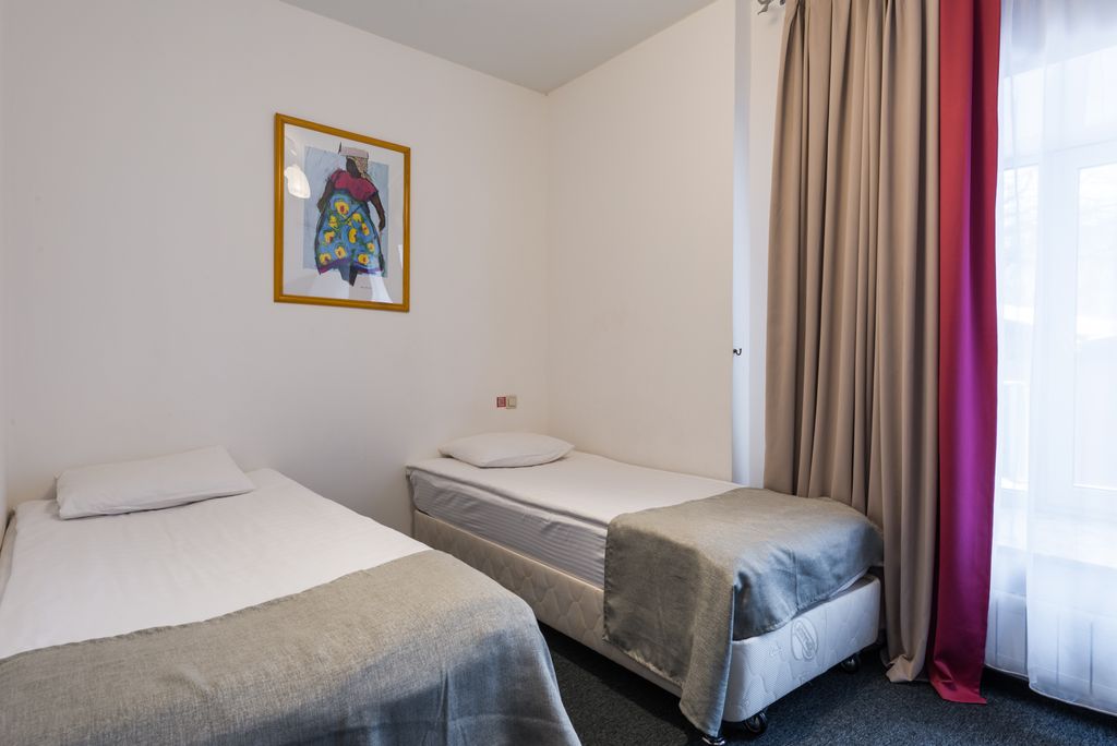 Двухместный номер с 2 отдельными кроватями комфорт