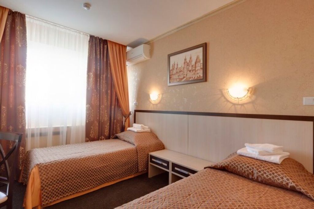 Двухместный номер с 2 отдельными кроватями Бизнес