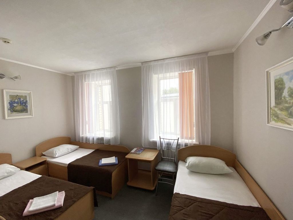 Двухместный номер с 2 отдельными кроватями + дополнительная односпальная кровать