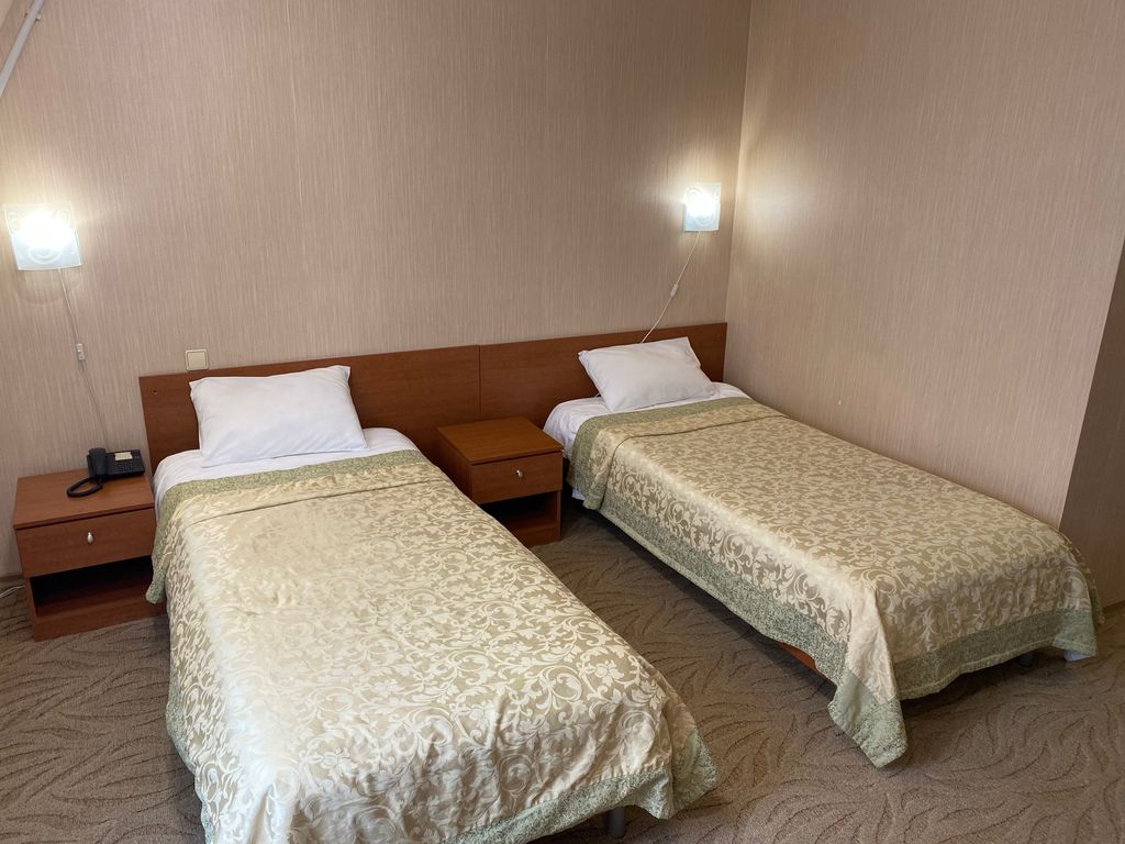 Двухместный номер с 2 отдельными кроватями стандарт