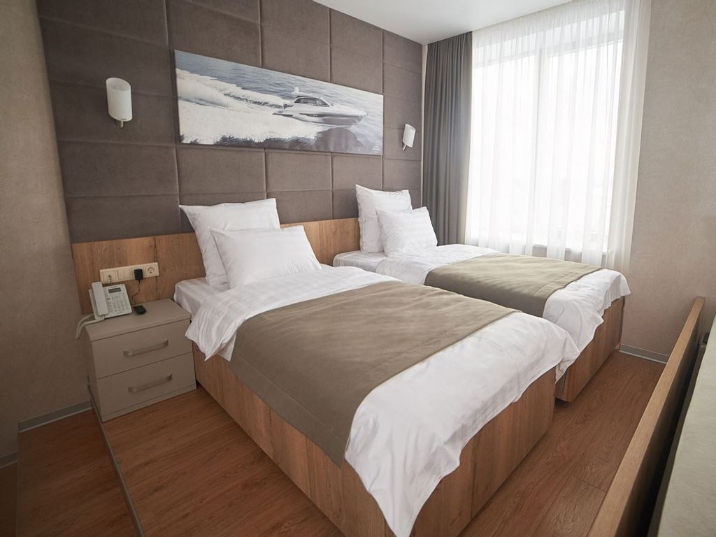 Двухместный номер с 2 отдельными кроватями улучшенный с видом на море