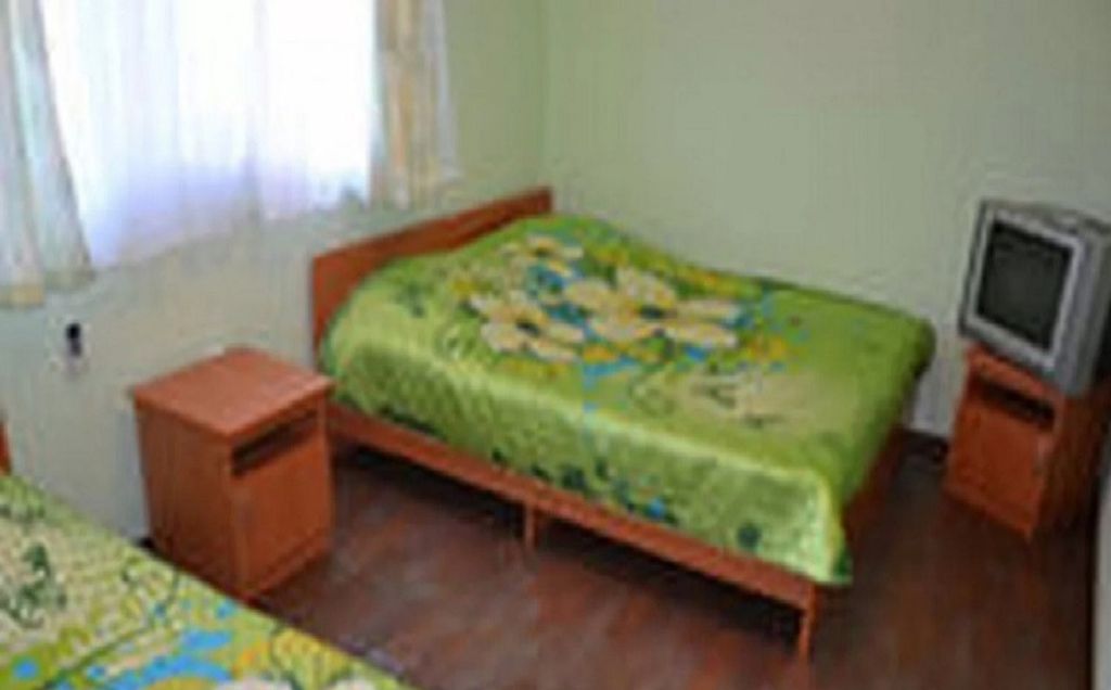 Четырёхместный номер стандарт с кухней и балконом