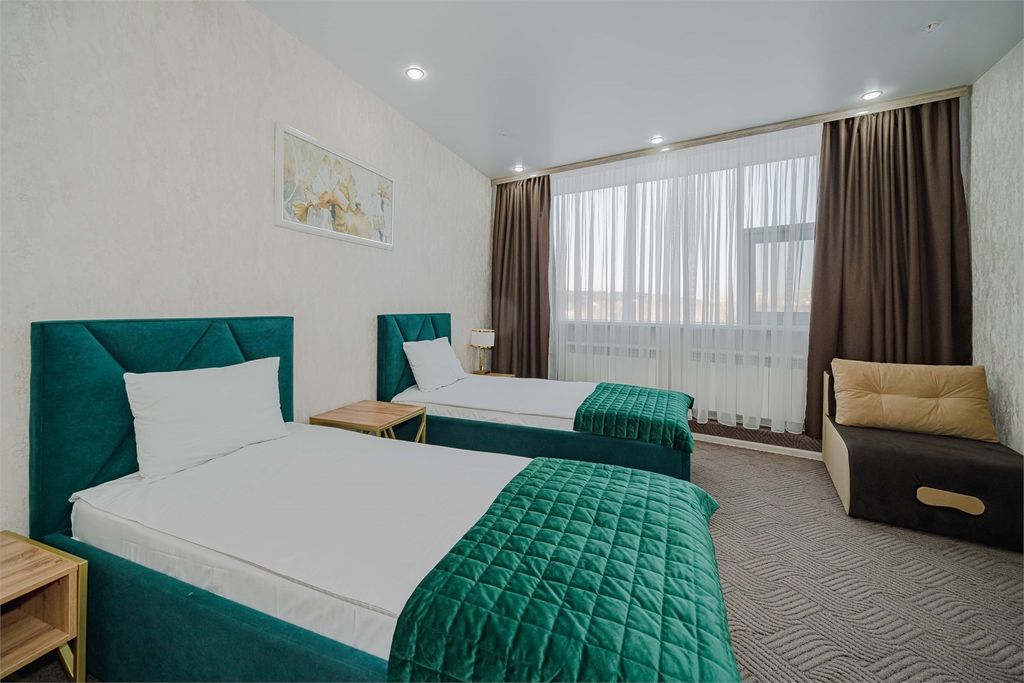 Двухместный номер с 2 отдельными кроватями улучшенный