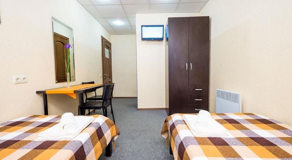 Двухместный номер с 2 отдельными кроватями стандарт на цоколе