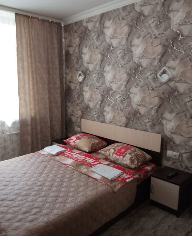 Двухместный номер с 1 кроватью эконом кing-size с общей ванной комнатой