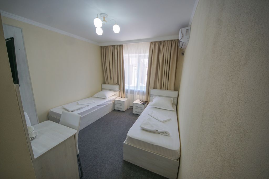 Двухместный номер с 2 отдельными кроватями Стандарт комфорт раздельные кровати