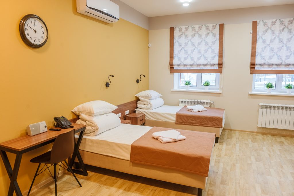 Двухместный номер с 2 отдельными кроватями улучшенный