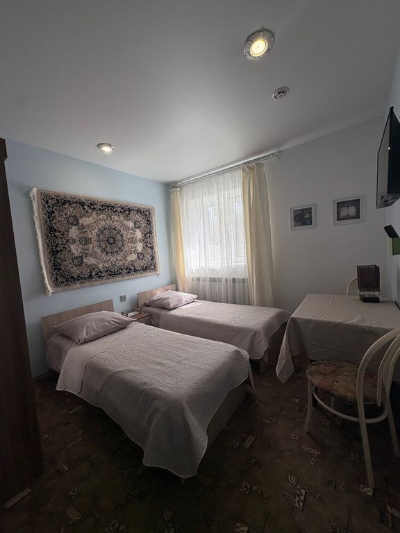 Двухместный номер с 2 отдельными кроватями стандарт