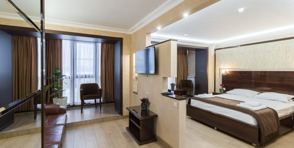 Двухместный номер с 1 кроватью представительский люкс