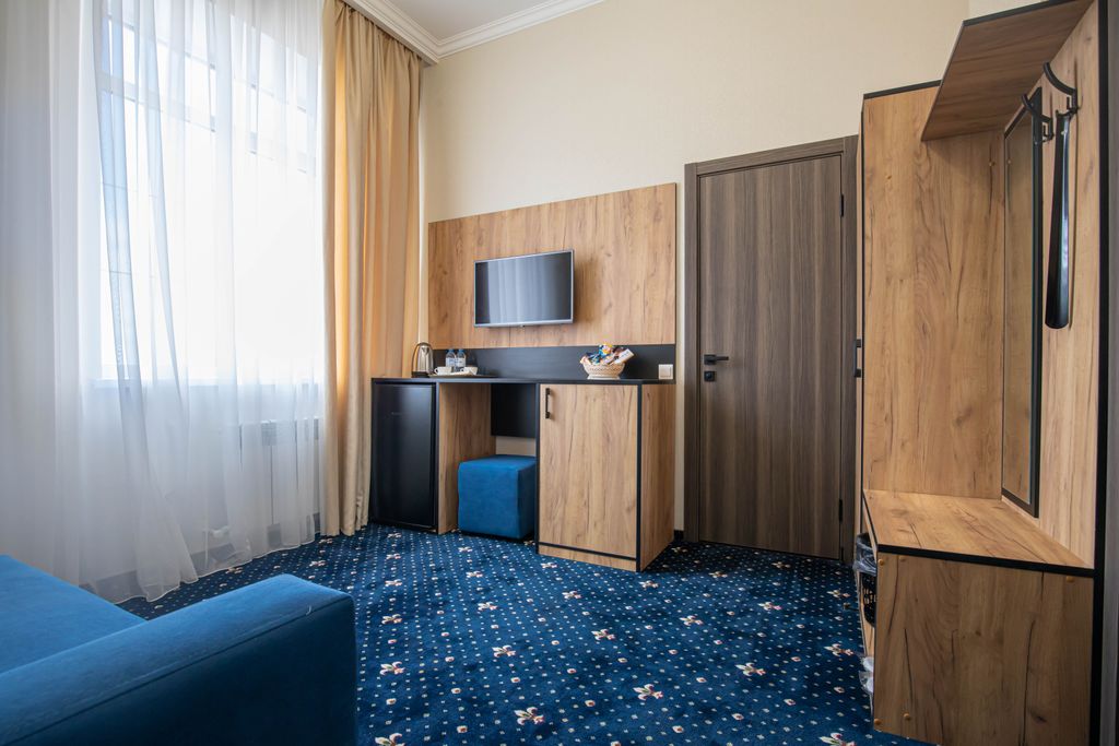 Семейный номер люкс с видом на город