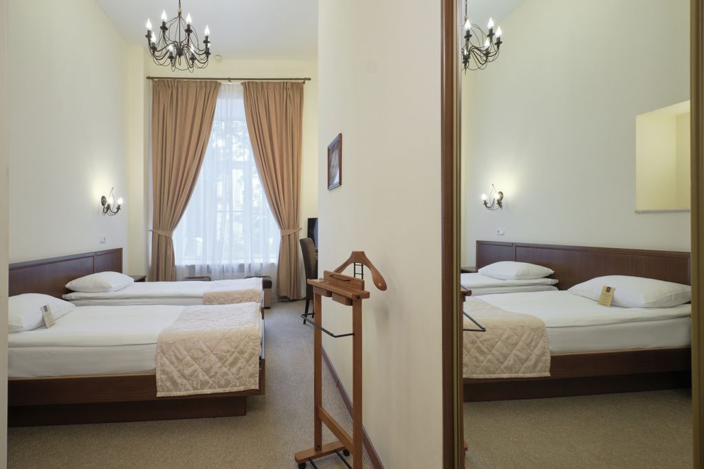 Двухместный номер с 2 отдельными кроватями Бизнес