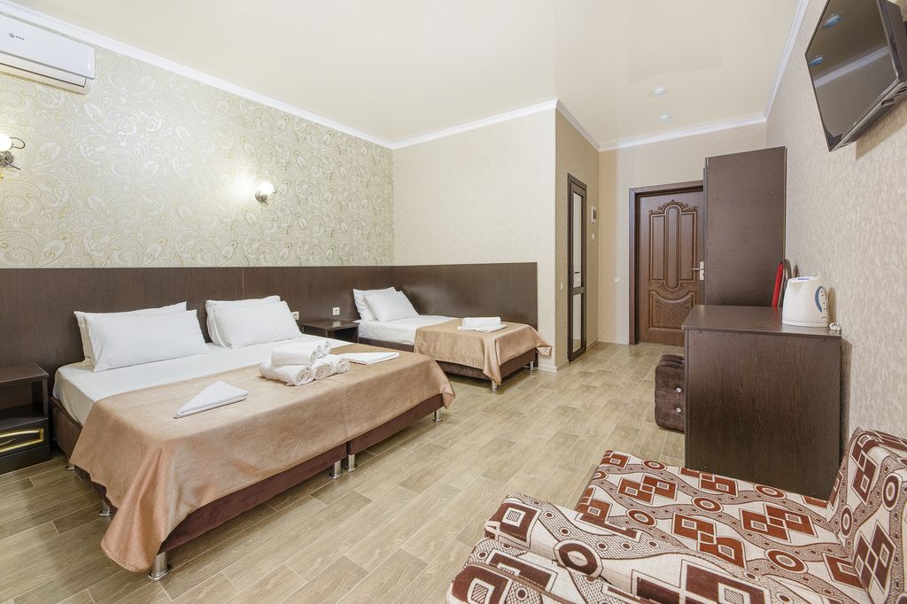 Четырёхместный номер делюкс