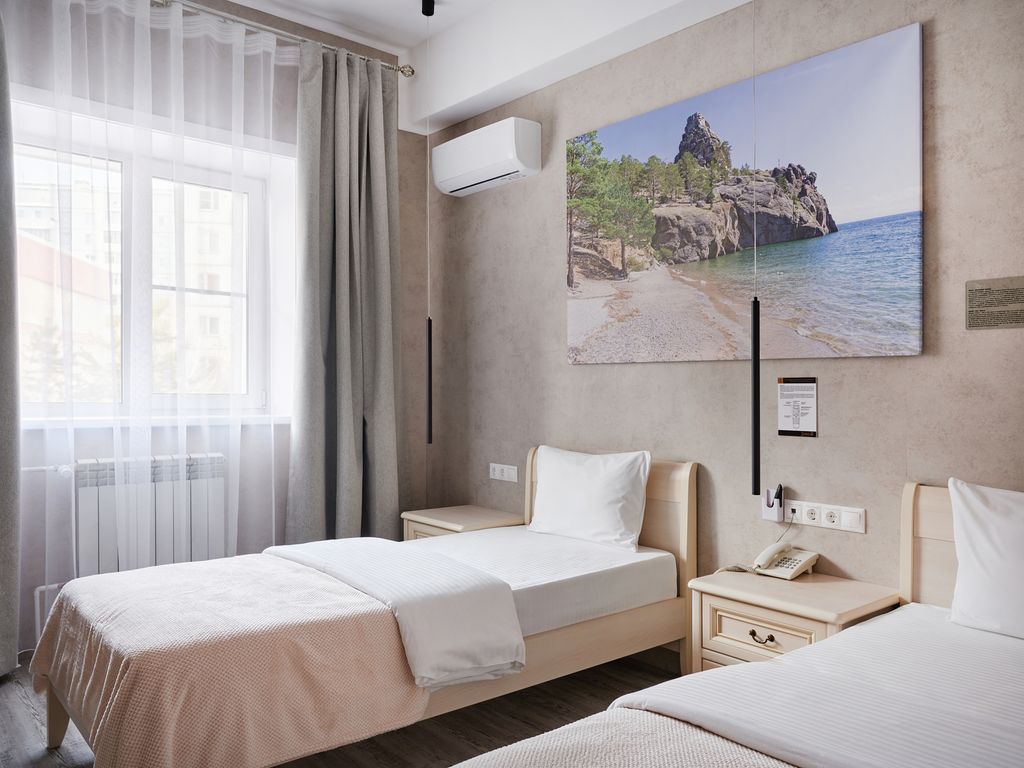 Двухместный номер с 2 отдельными кроватями  первой категории стандарт